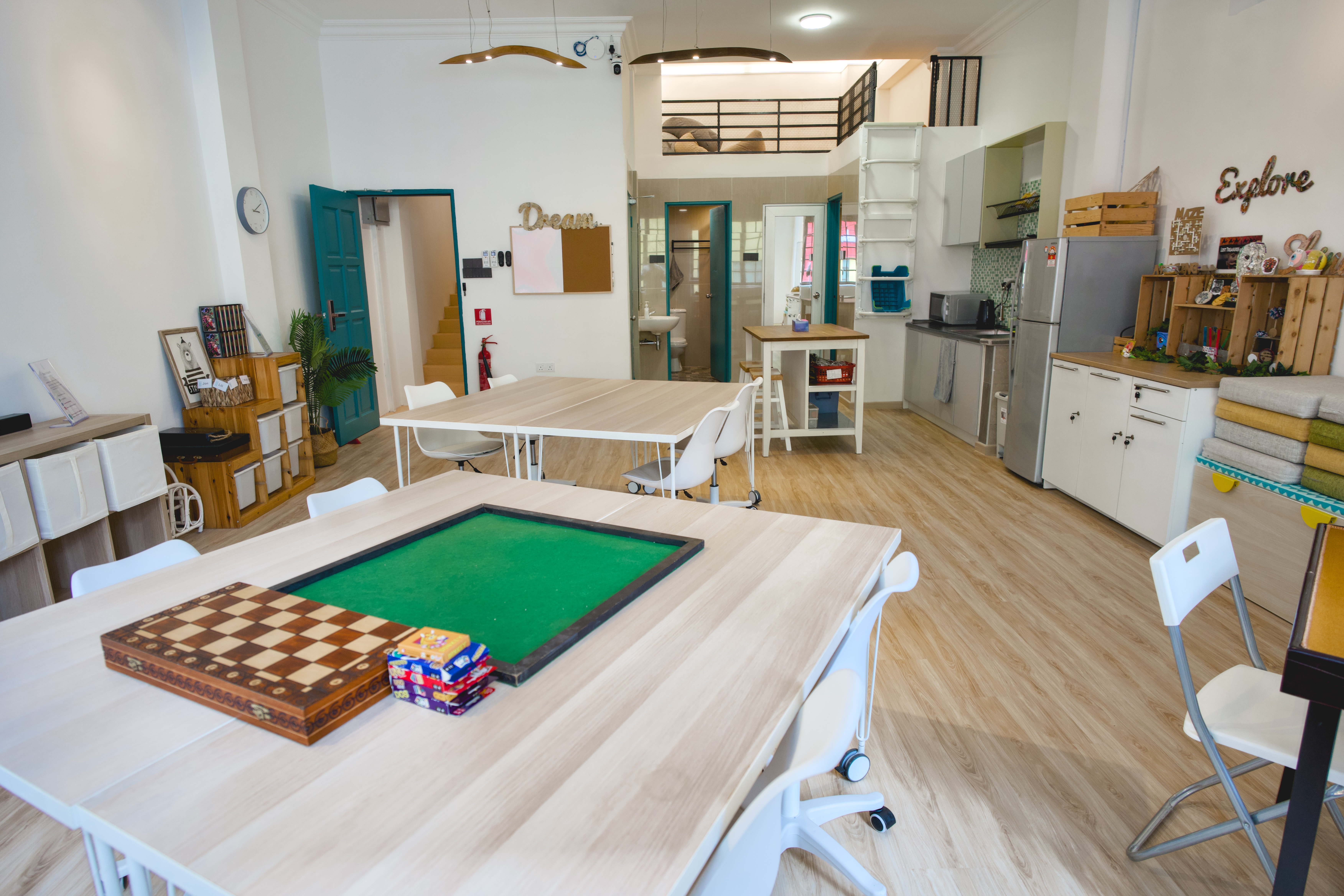 A shared studio and lounge space inside the Nomad Shophouse