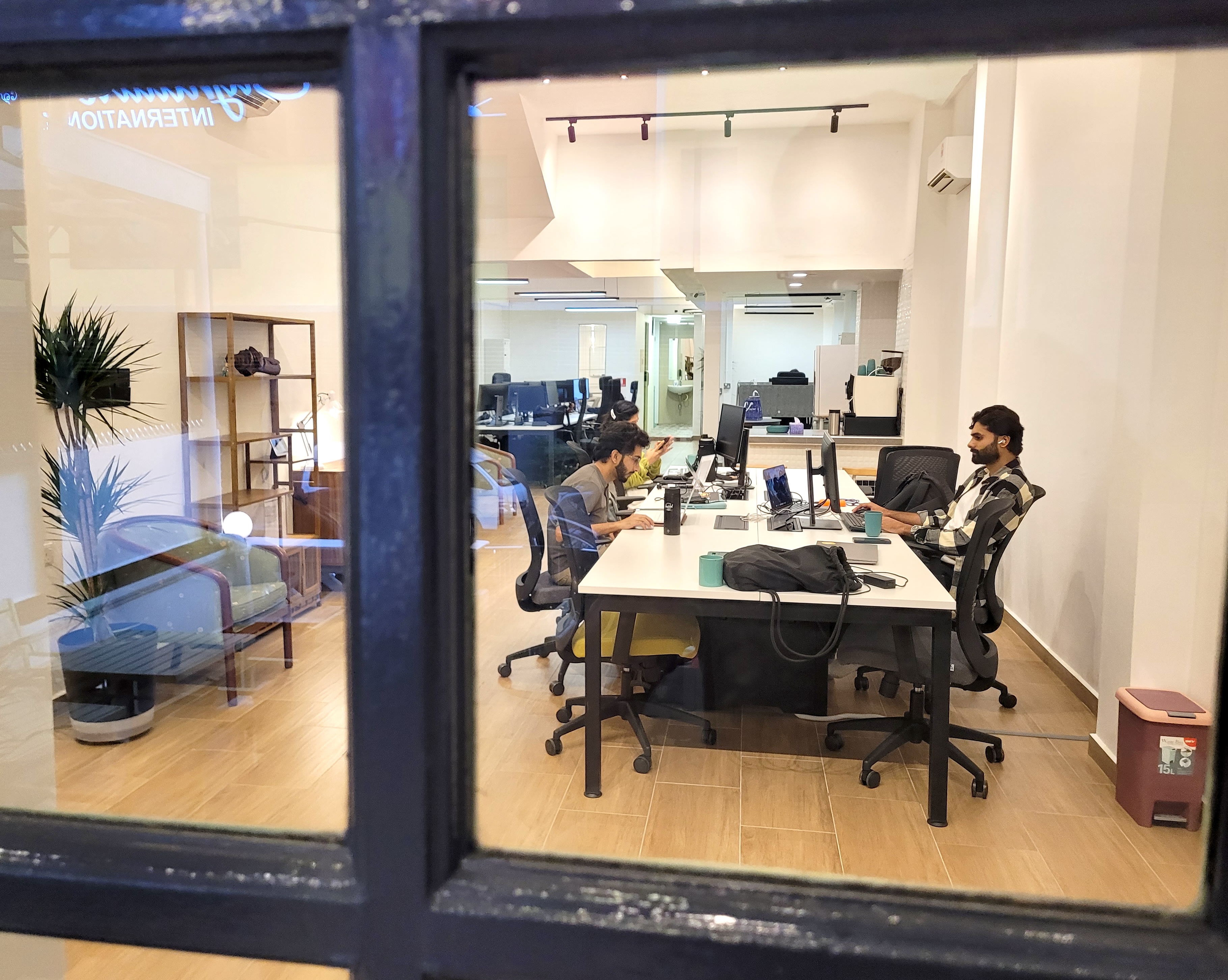 Remote professionals working together at the Nomad Shophouse