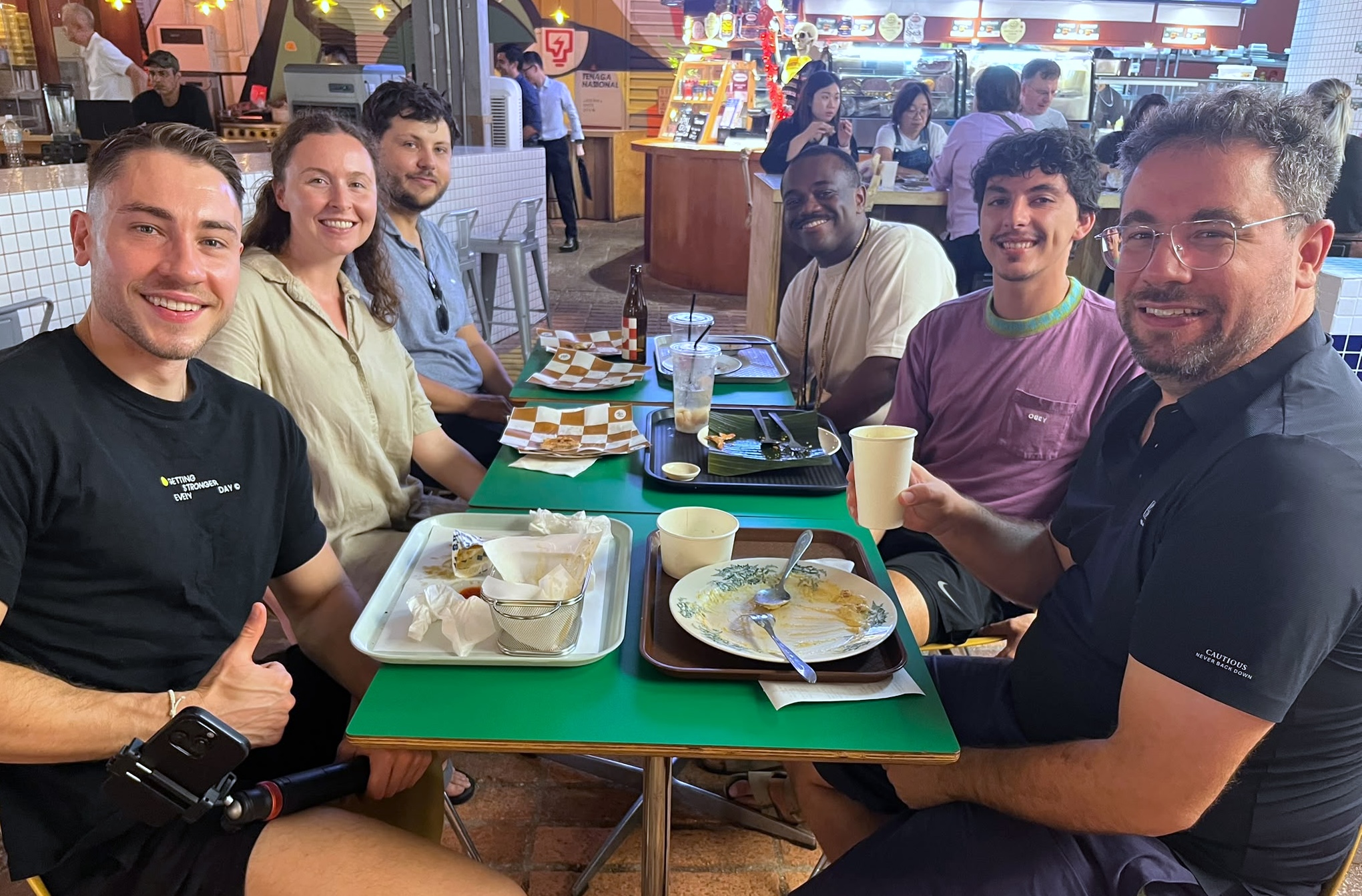 Members of the Nomad Shophouse community sharing Wednesday lunch